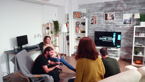 Game-over-for-bearded-man-with-long-hair-while-playing-video-games