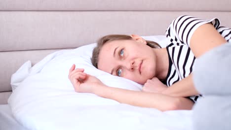 depressive state of a woman she is upset and lies on the bed depressive state of a woman she is upset and lies on the bed concept of worried state depression anxiety hopelessness difficult period