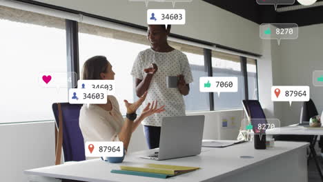 animation of notification bars over diverse female coworkers discussing on desk in office