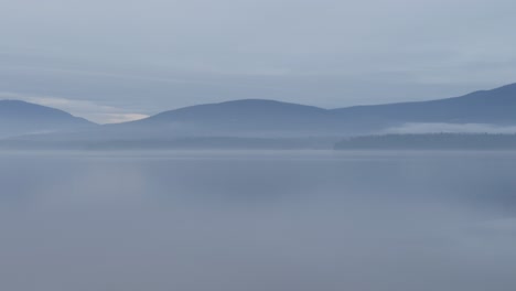 foggy, beautiful, mysterious early spring day on a pristine mountain lake