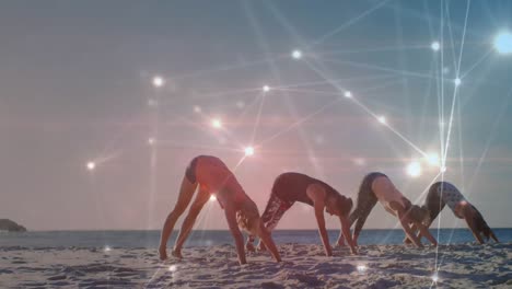 Animation-of-data-processing-over-group-of-female-friends-practicing-yoga,-meditating-at-the-beach