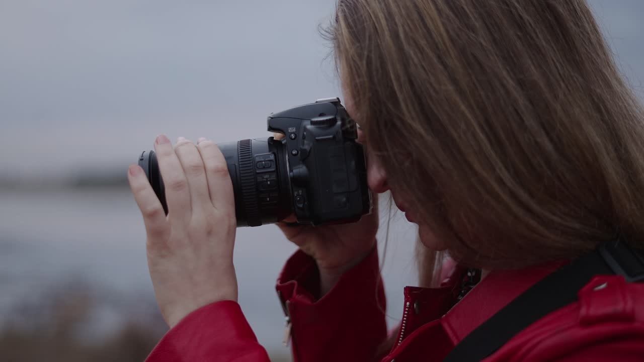 Woman Taking Photo with DSLR Camera