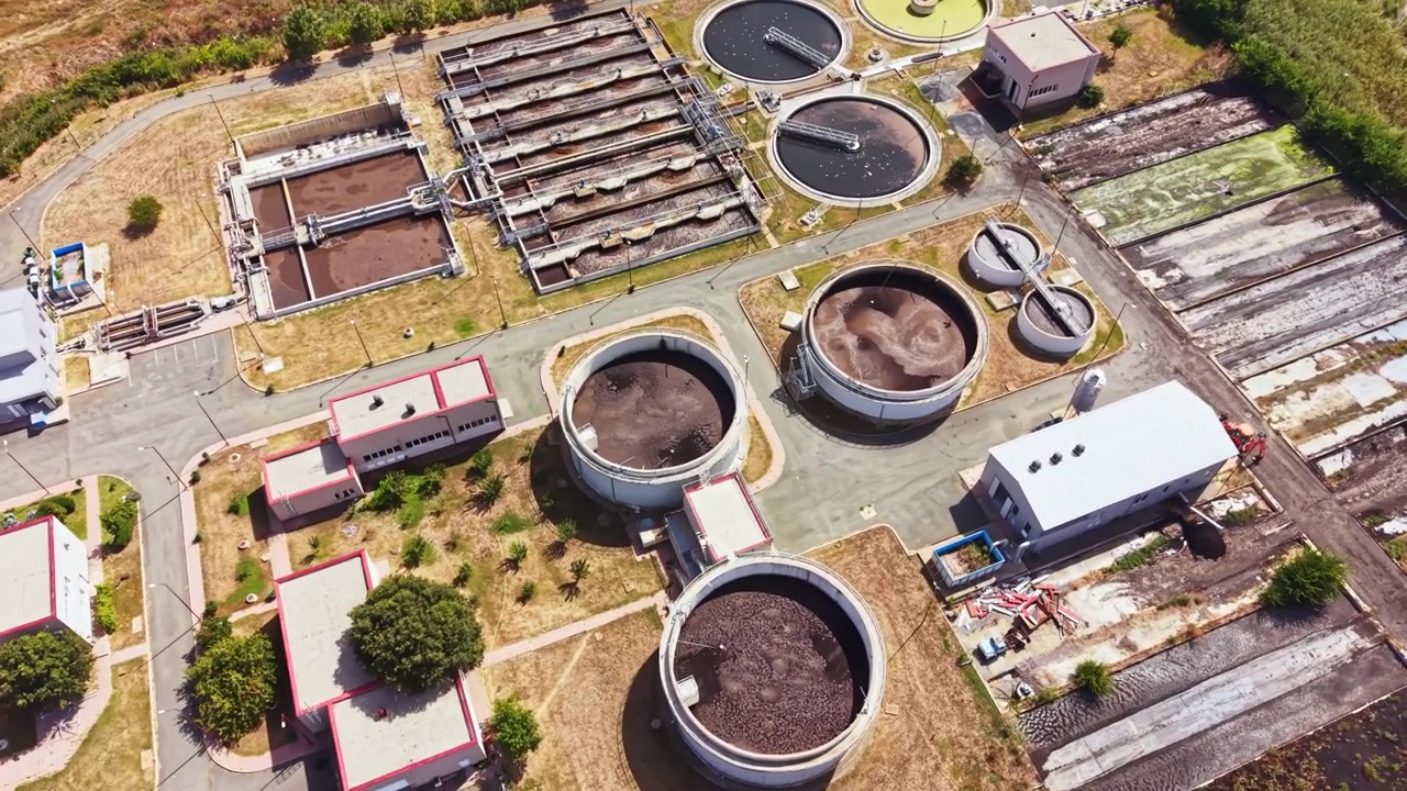 Water treatment facility located in a rural area showing various processing tanks and treatment systems