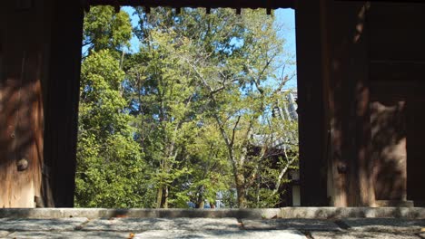 Slide-shot-of-an-entrance-to-a-temple-in-Kyoto,-Japan-4K-slow-motion