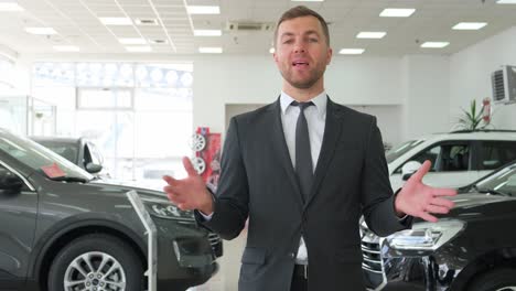 car salesman in a showroom