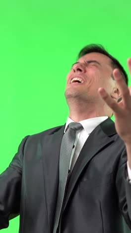 Businessman in Distress and Pain on Green Screen