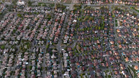 Aerial-of-middle-class-neighbourhood-of-houses-near-industrial-area-of-the-town