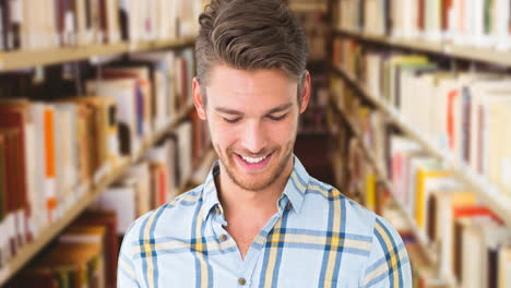 animation of happy caucasian man reading book over library