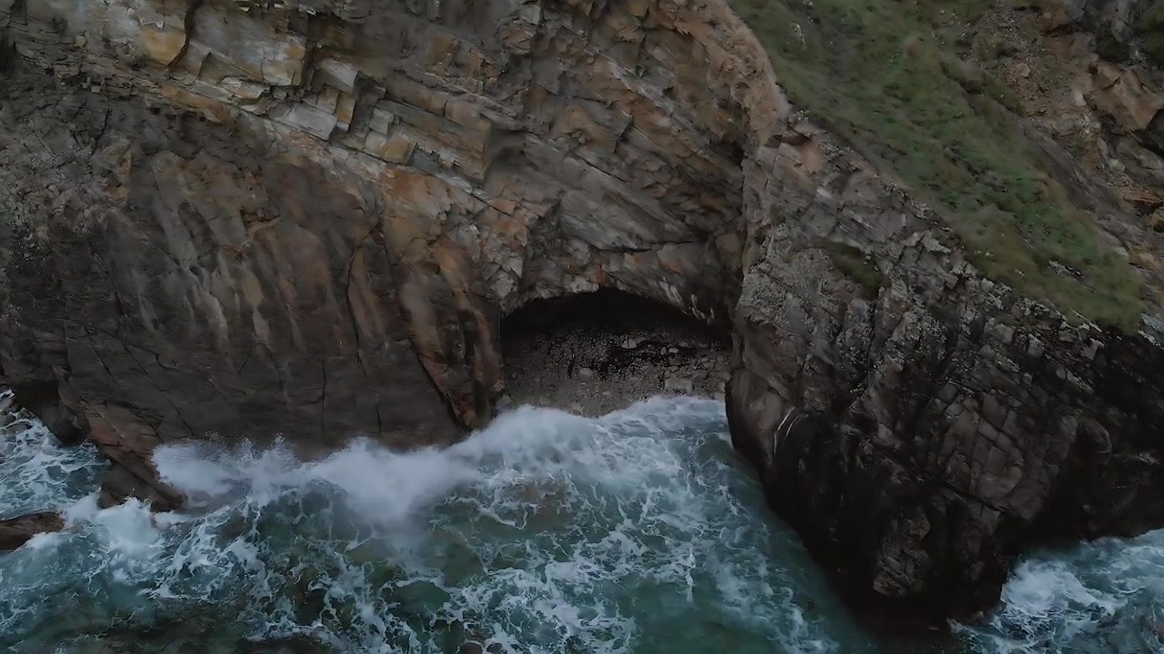 Crohy Head in Donegal Ireland waves crash into cliffs