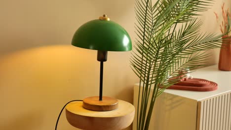 green table lamp with wooden base