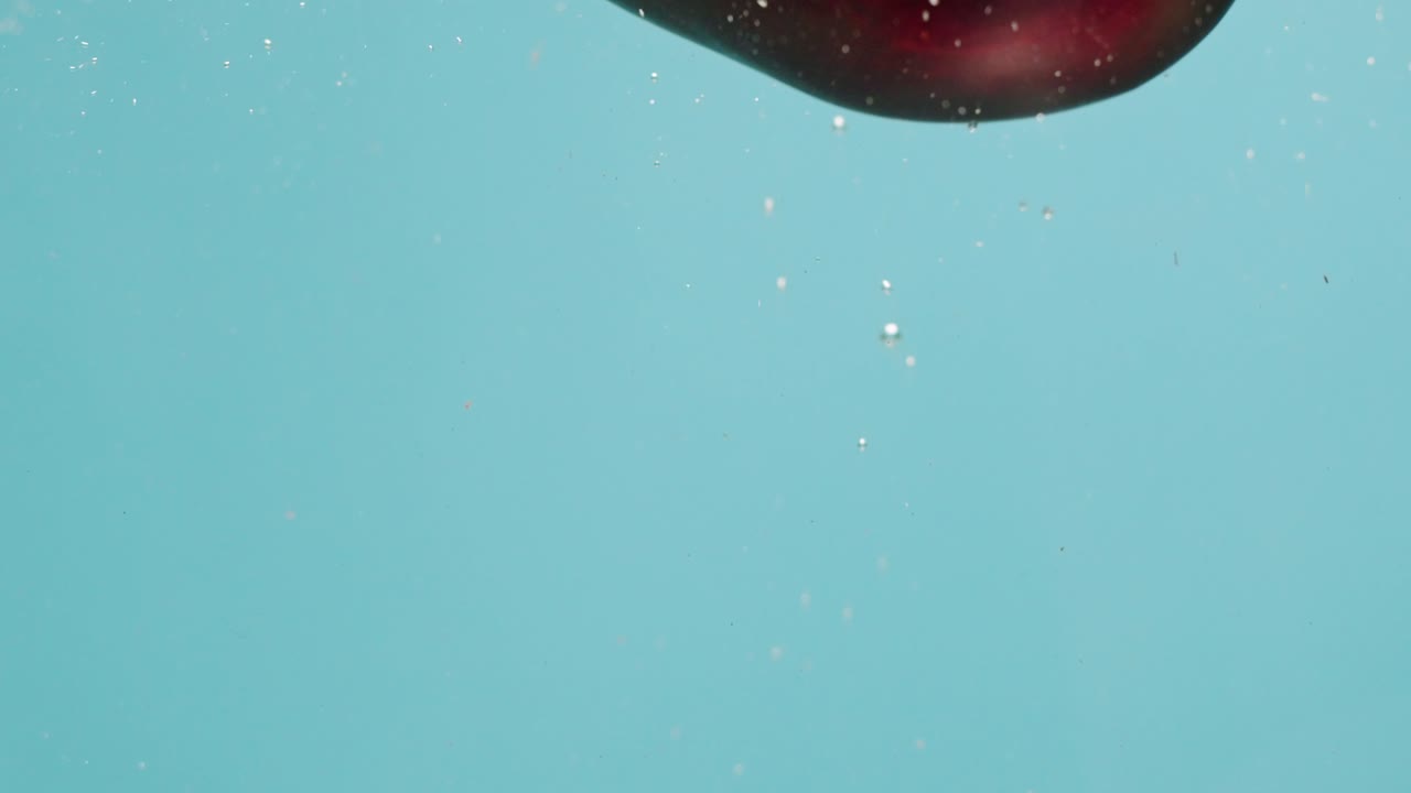 Eggplant Dropping Underwater