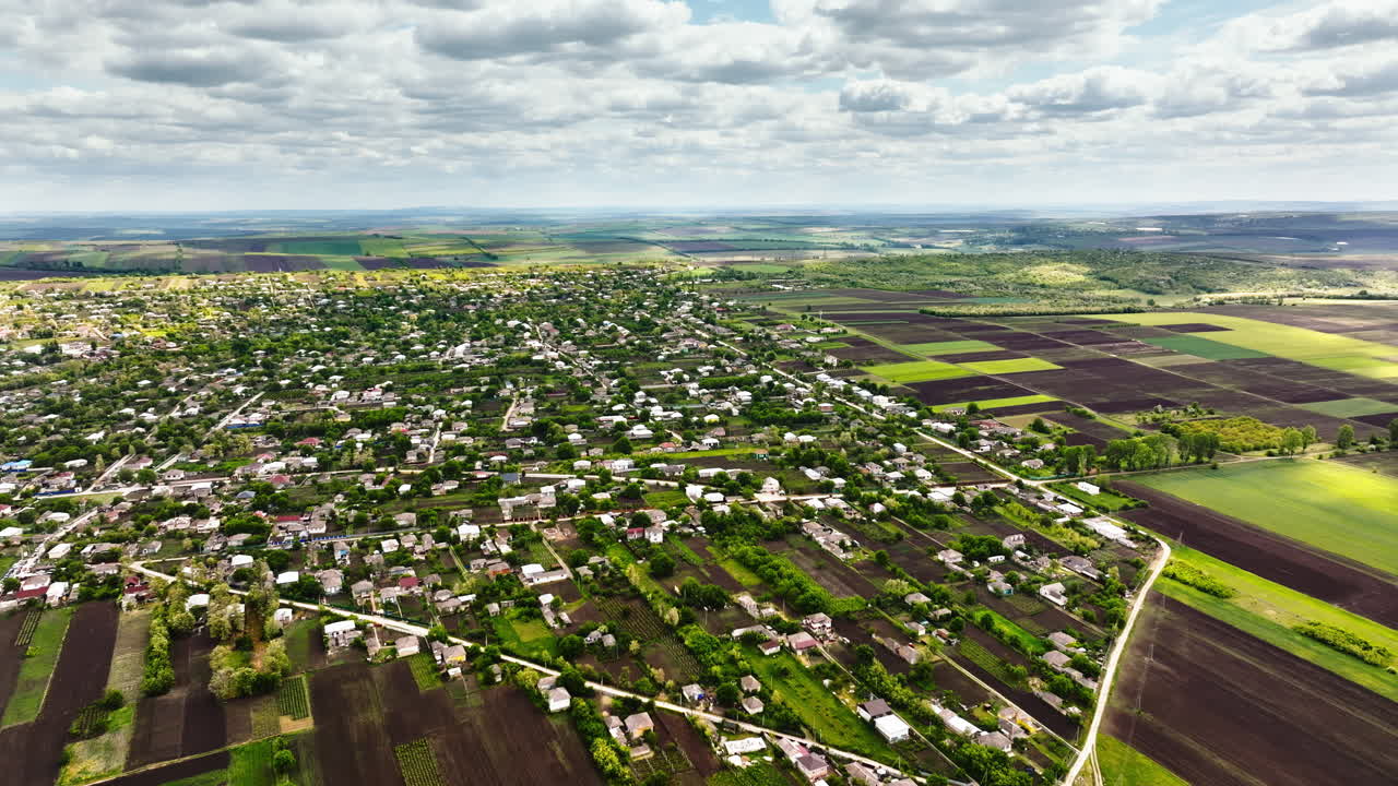 Aerial drone view of Pelinia, Drochia, Moldova with a cloudy sky