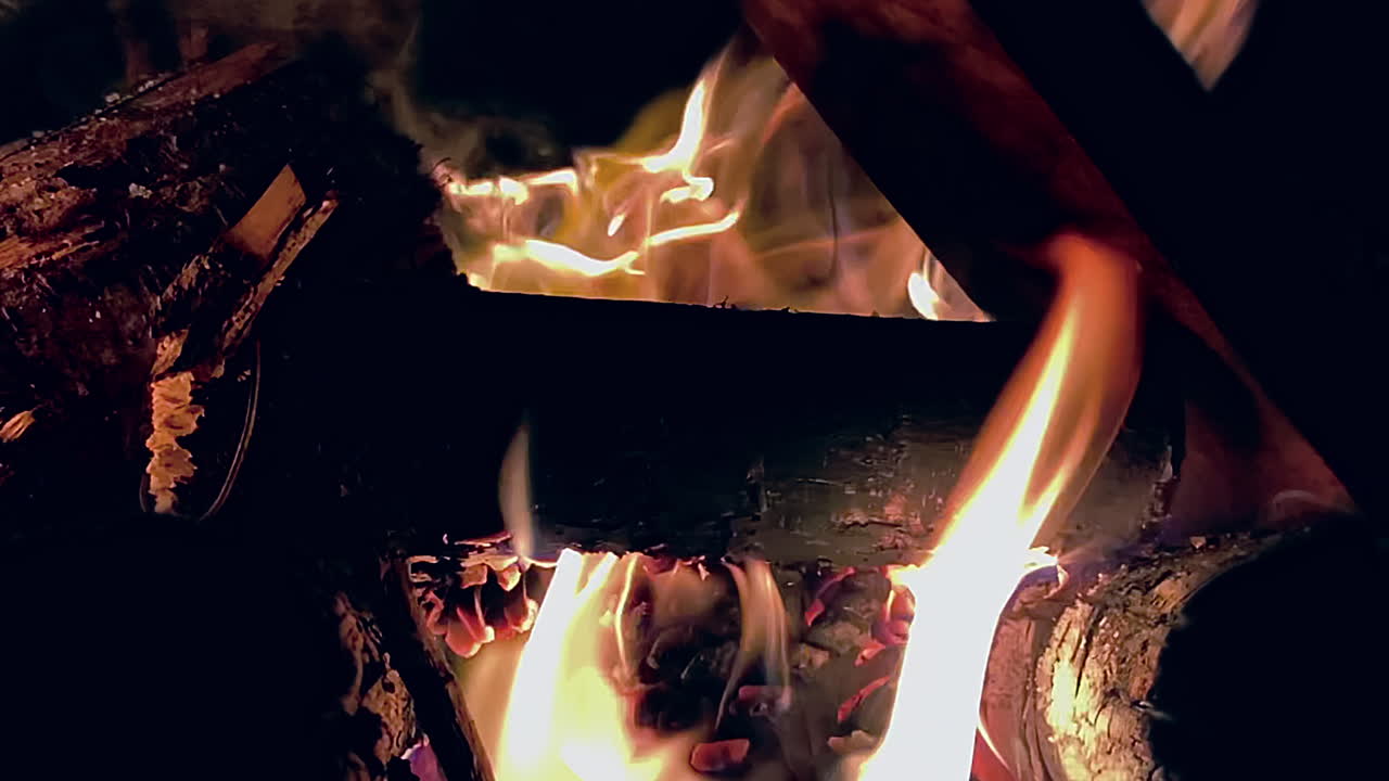 Fire burning in the fire pit shot in slow motion 120fps.
