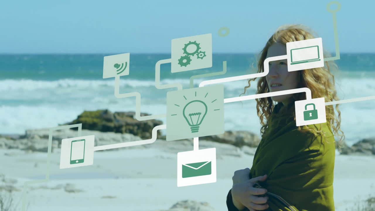 On beach, woman using animation of technology icons and network connections
