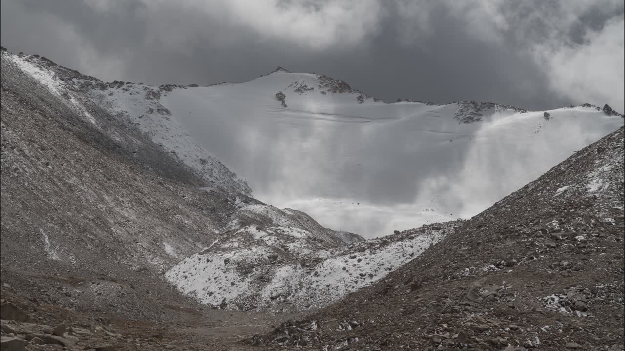 Snowy Mountain Peaks and Valley