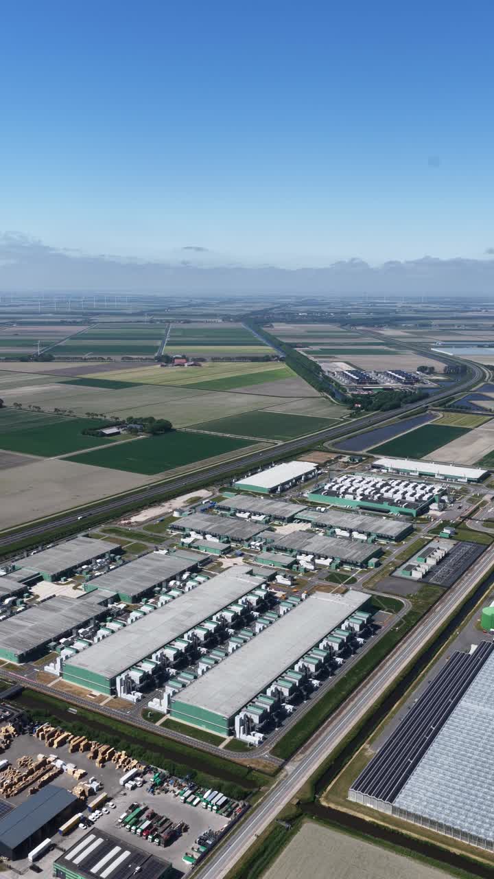 vertical video of large scale datacenter, AI, internet, clouds services infrastrucutre. Aerial drone view.