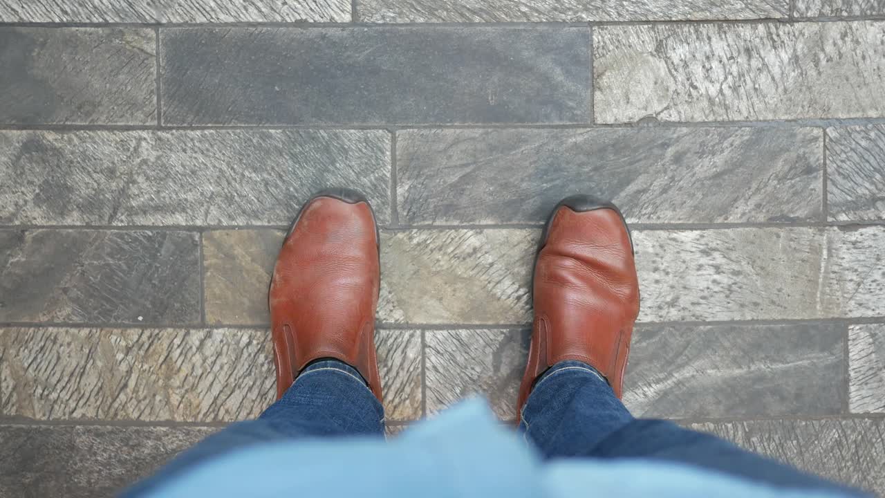 Shoes on a brick floor