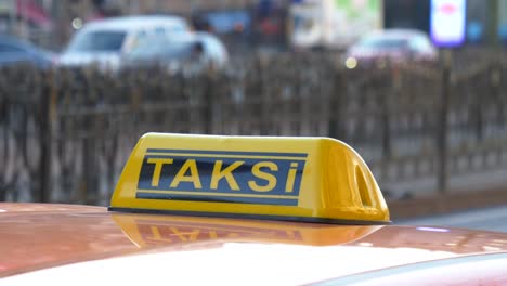 yellow taxi sign