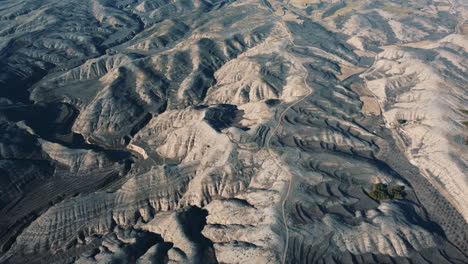 aerial view of arid landscape with terraced farming