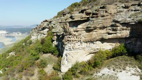 aerial view of rock sanctuary, chit kaya, an ancient cliff in bulgaria, with an expansive view of the mountain