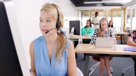 Call-centre-staff-working-in-a-modern-office