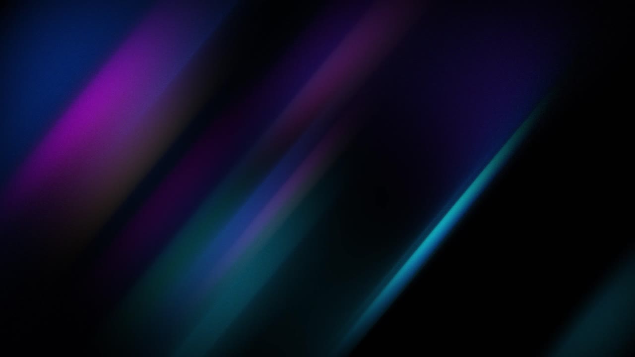 Abstract Colorful Light Streaks Moving Diagonally on Dark Background