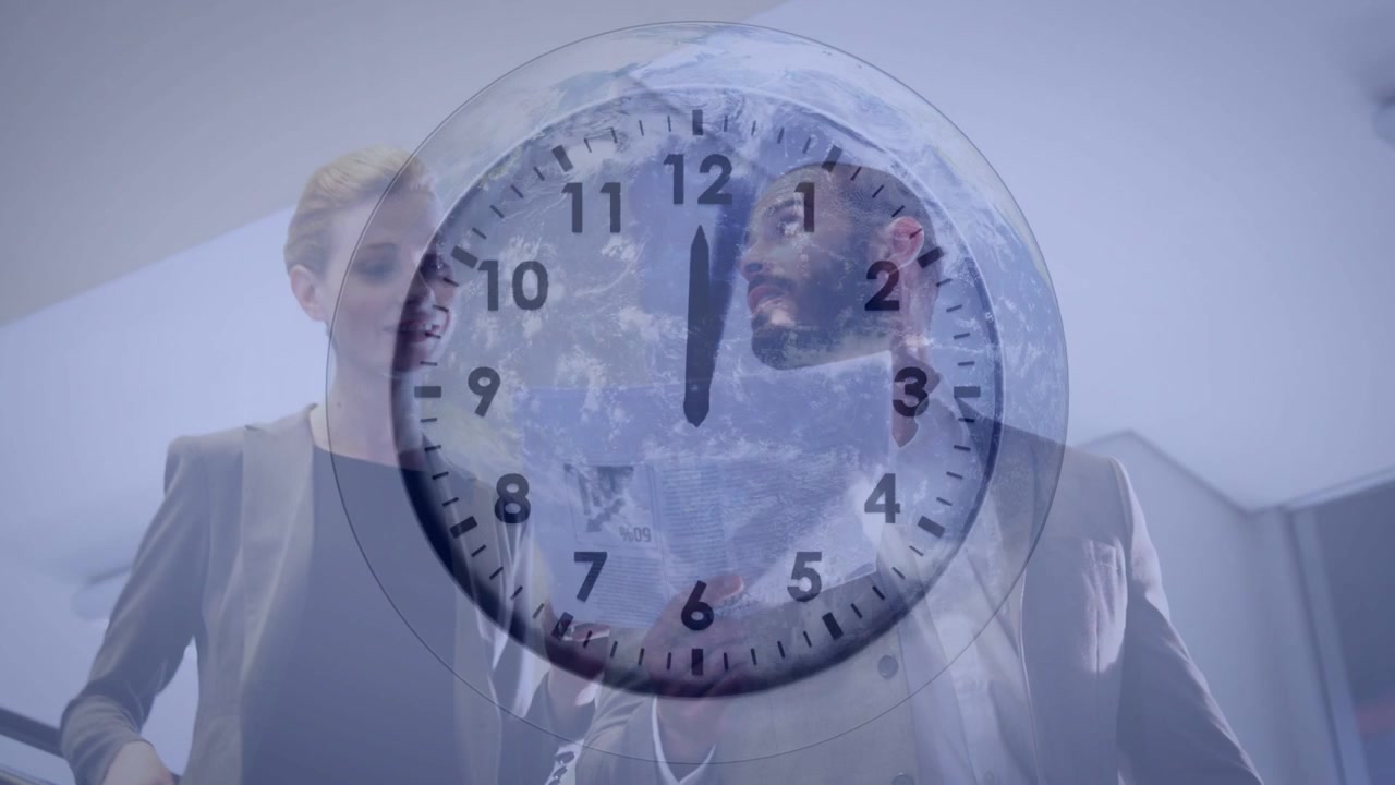 Colleagues reviewing business docs near stair, clock globe rotating over them, meeting deadline