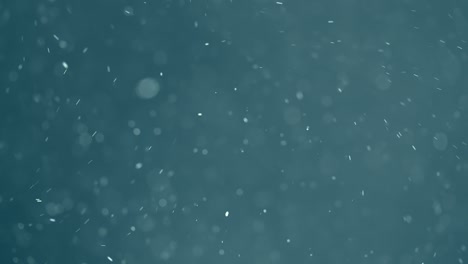 partículas azules frías que caen fuertemente