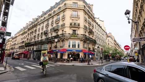 time-lapse of a bustling parisian street corner.