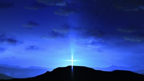 bright cross on the hill with clouds moving on blue starry sky