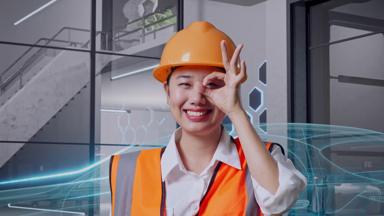 현대적 인 사무실 환경 에서 미소 짓는 여성 엔지니어