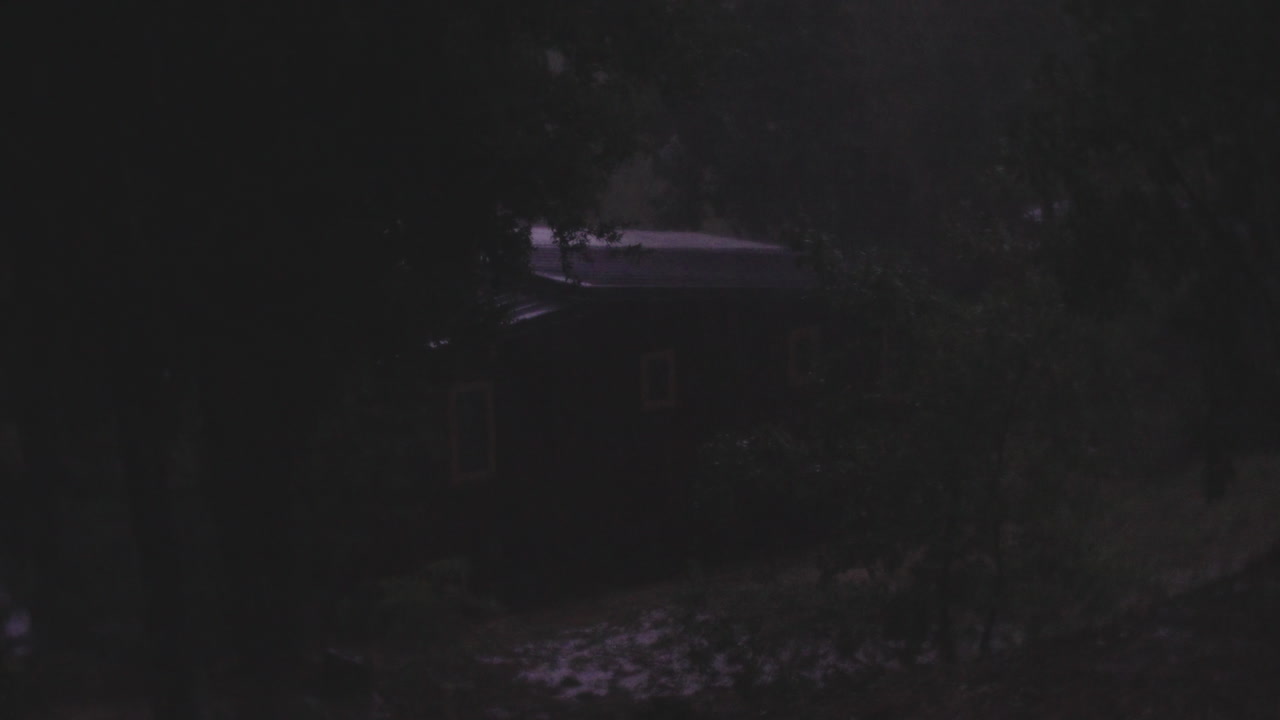 Dark image of a house at night