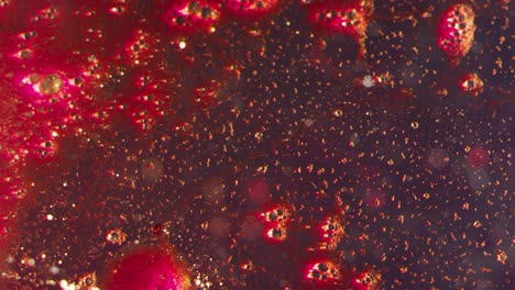expanding galaxy splash blood red splatter texture bokeh background