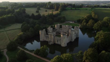 The-Beautiful-Bodiam-Castle-In-England-With-Large-Moat-Drone-Aerial-Sunset