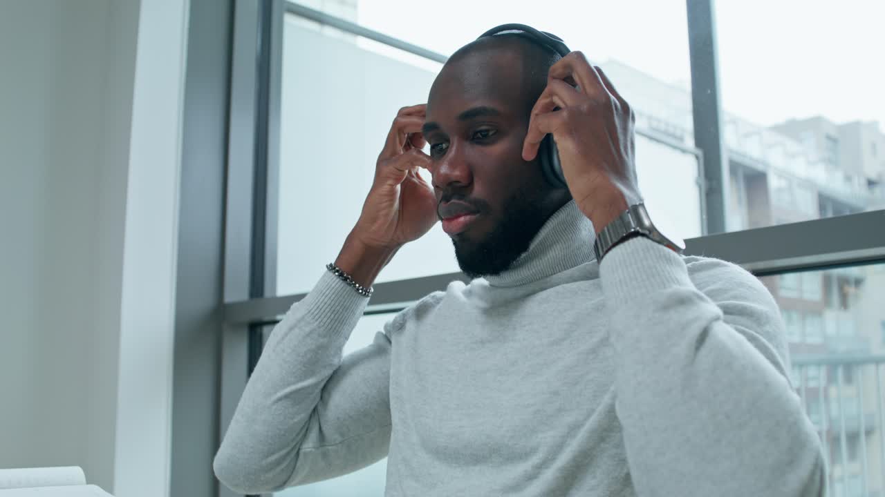 Man listening to music indoor