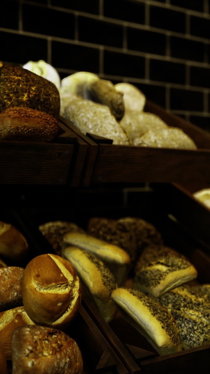 Freshly baked artisan bread displayed in a cozy bakery at dusk