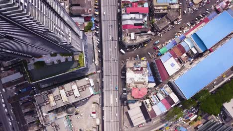 drone shots of kuala lumpur city traffic and streets, malaysia, uhd