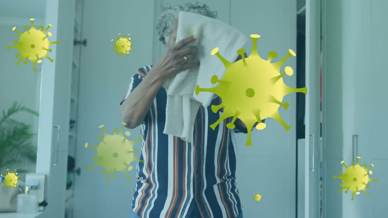 animación de células de virus sobre mujer afroamericana con toalla