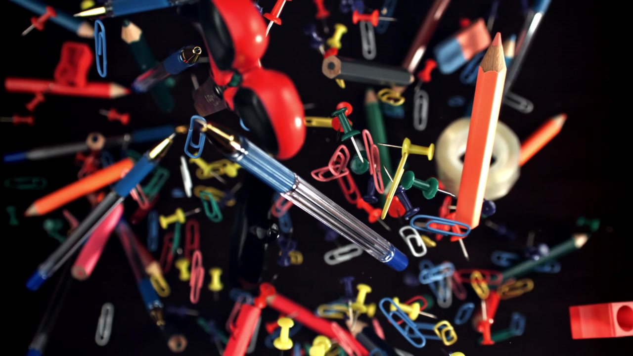 Colorful Office and School Supplies Floating in Slow Motion
