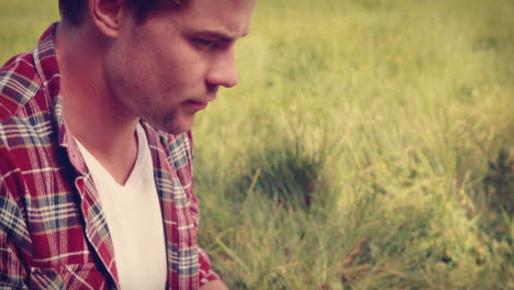 Handsome-hipster-using-his-laptop