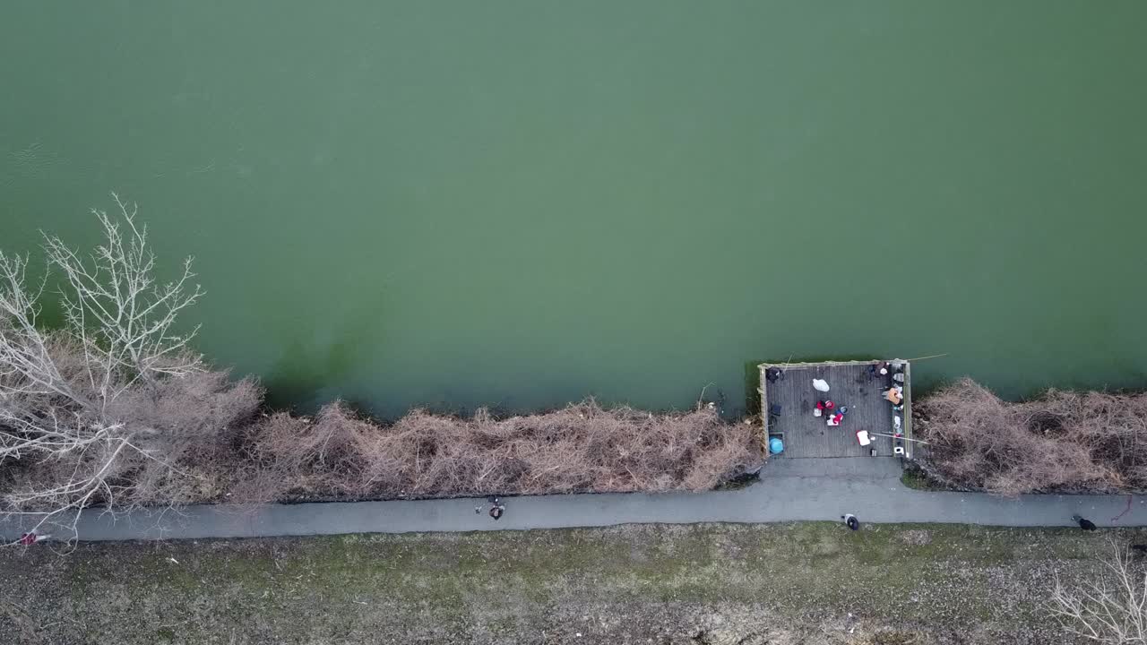 People fishing the Detroit River near Monroe Michigan. Top down view
