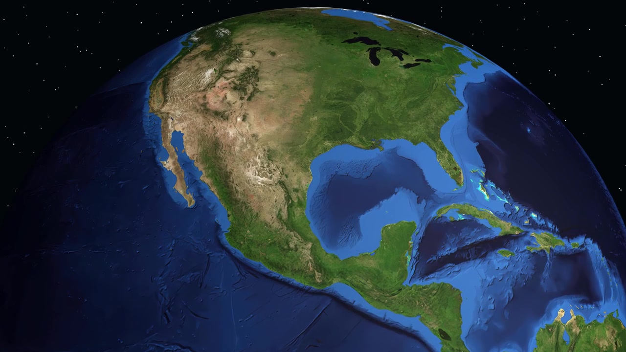 Digital globe rotates and zooms into Texas, displaying geographic data for South Padre Island