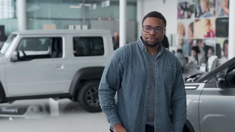 a dark-skinned man quickly receives offers regarding money and purchases