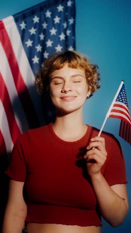 woman holding american flag