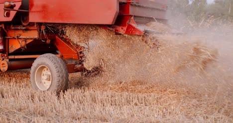 close up of combine harvester on field at farm 11