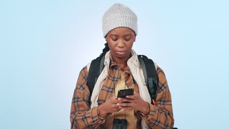Phone,-search-and-black-woman-hiking-in-studio