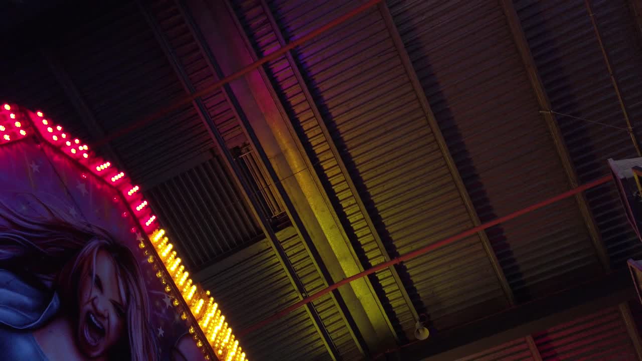 Vibrant Amusement Park Rides and Themed Attractions at Night