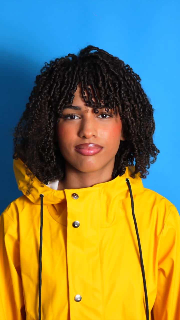 Woman in Yellow Raincoat