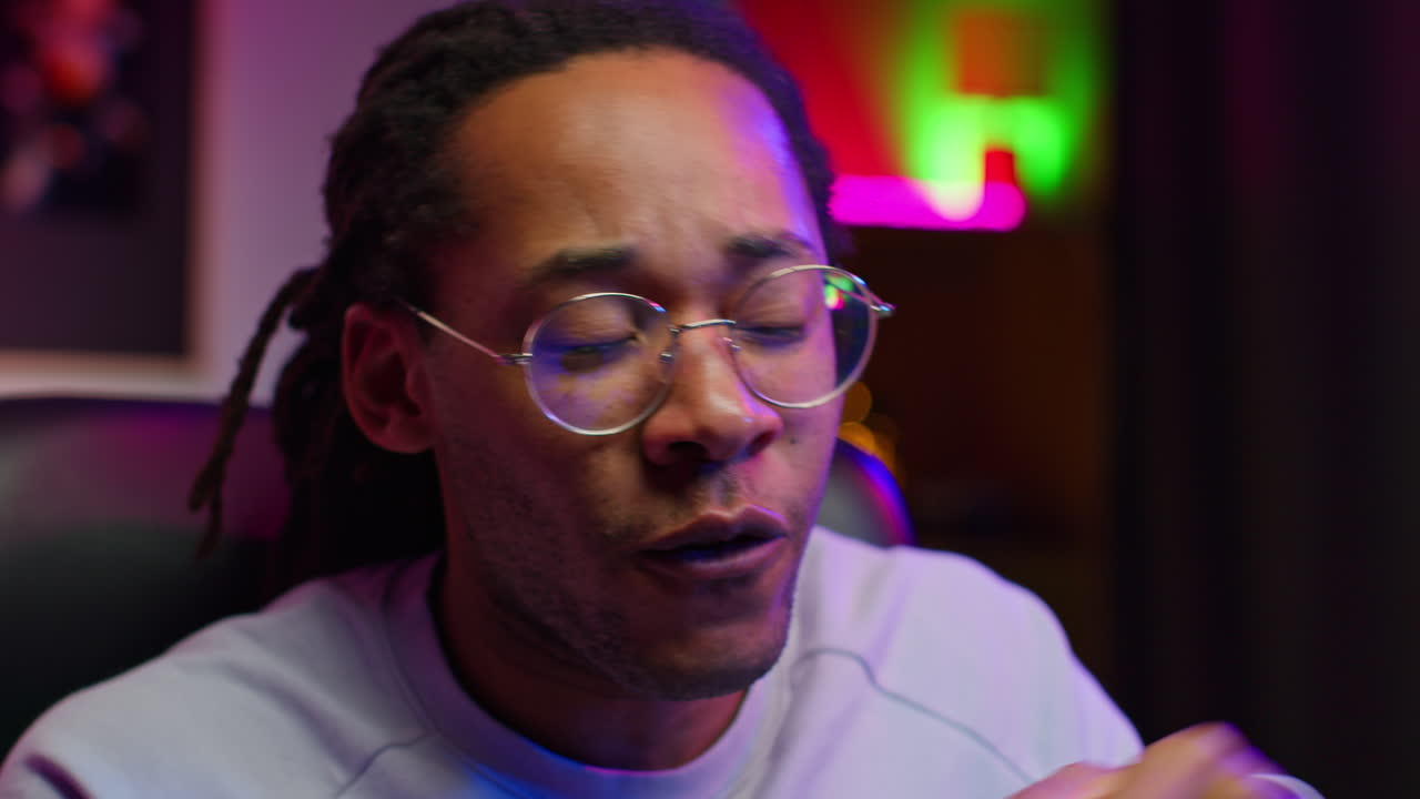 Closeup of a man looking at the camera and talking