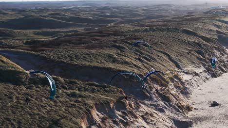 paragliding over sand dunes